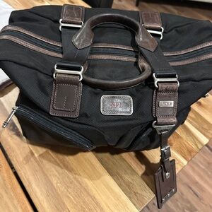 Tumi Black and Brown Duffel Bag with Durable Design